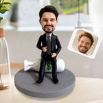 Personalized Bobblehead in Suit Sitting on Money Bag
