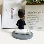 Personalized Bobblehead in Suit Sitting on Money Bag